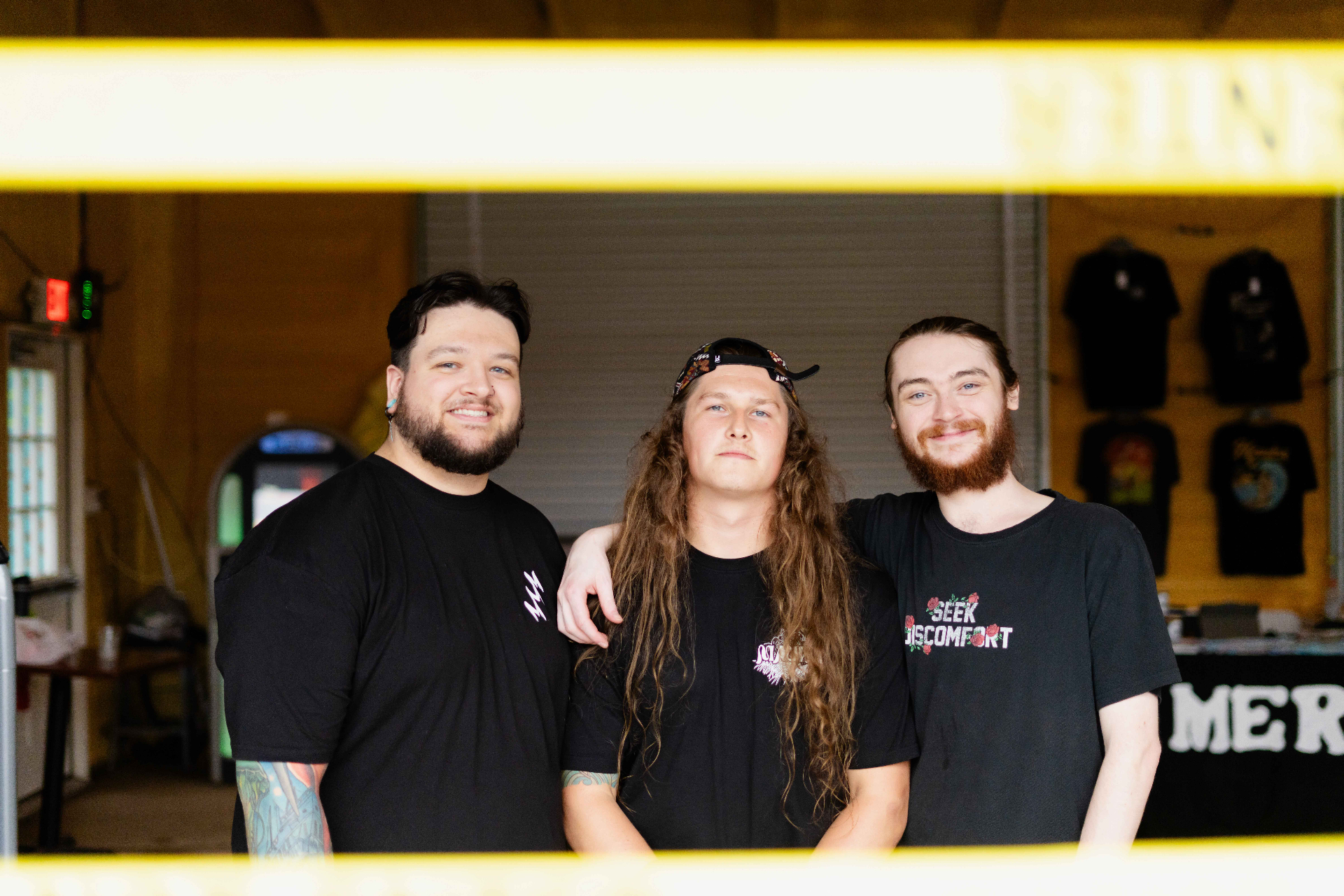 Behind the merch